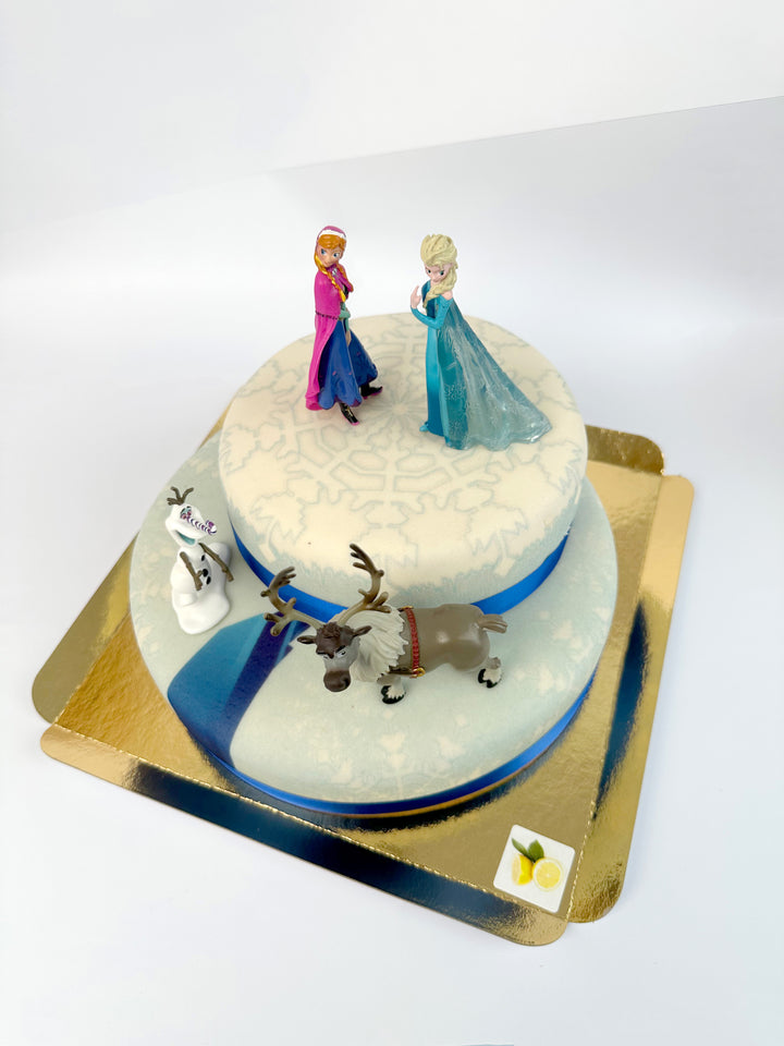 Anna®, Elsa®, Olof® & Sven® från Frost® på tvåvåningstårta