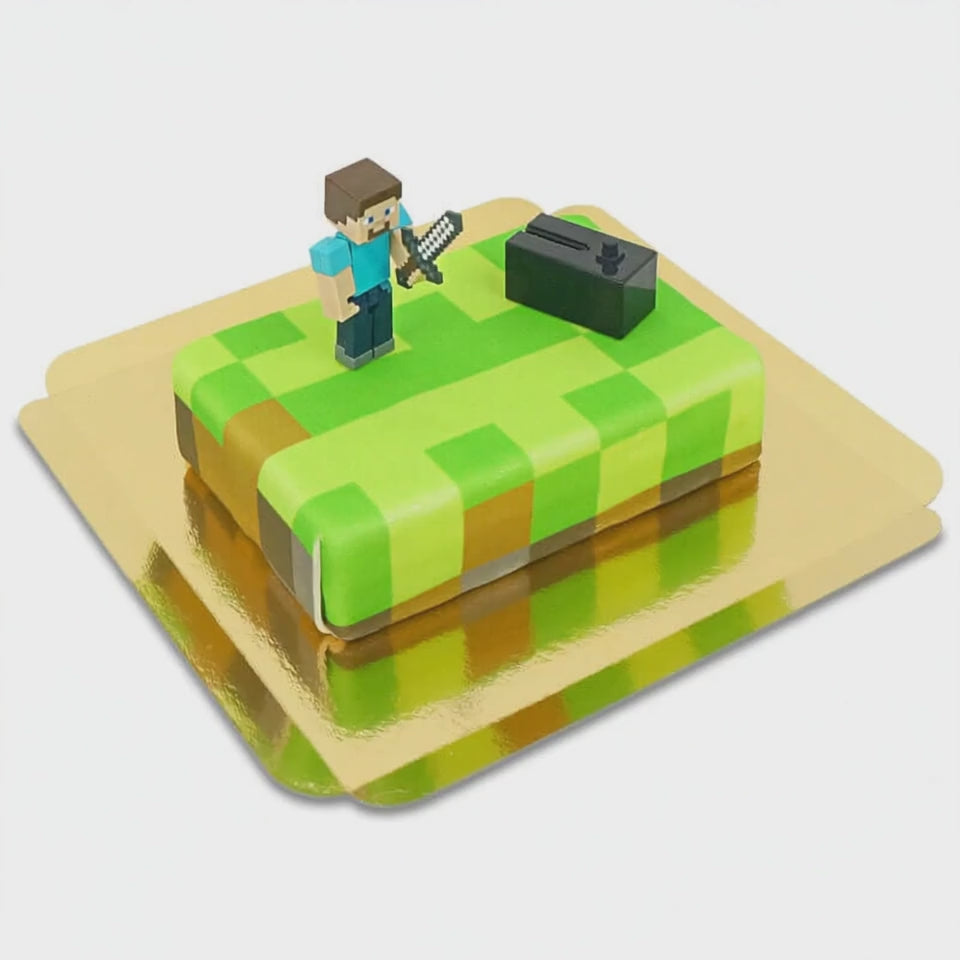 Minecraft®-figur på spelvärldstårta